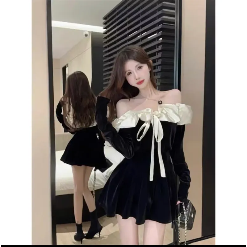 Váy nhung bèo vai phối nơ 1008332