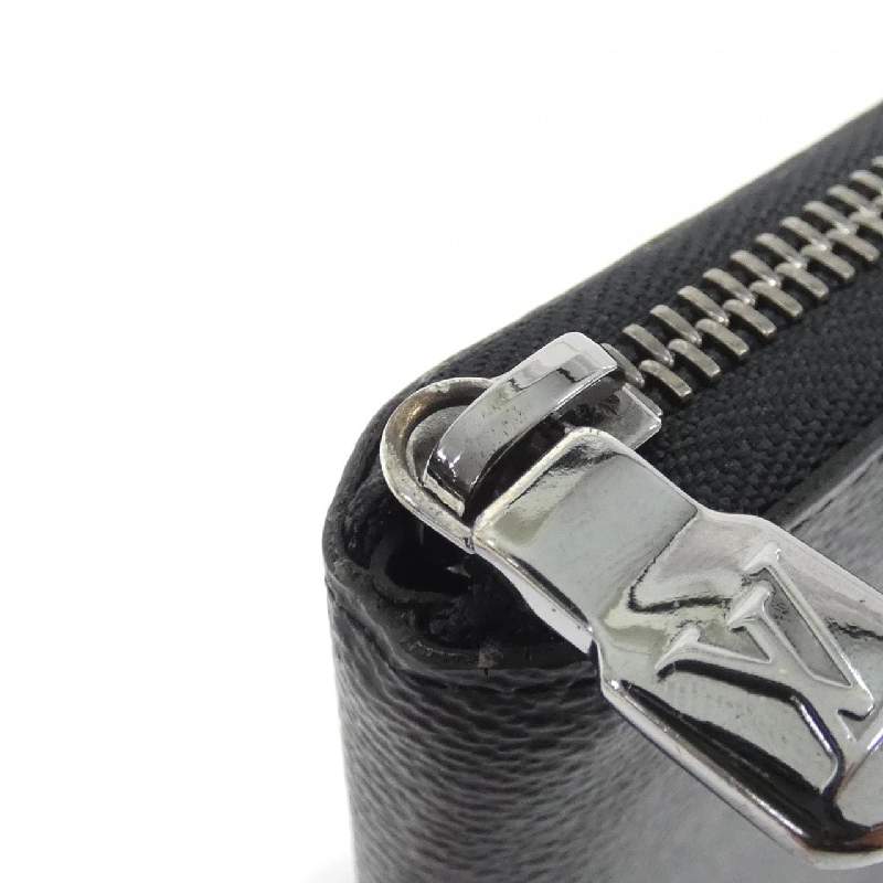 Ví Louis Vuitton Monogram Eclipse Zippy Wallet Vertikal M62295 621515