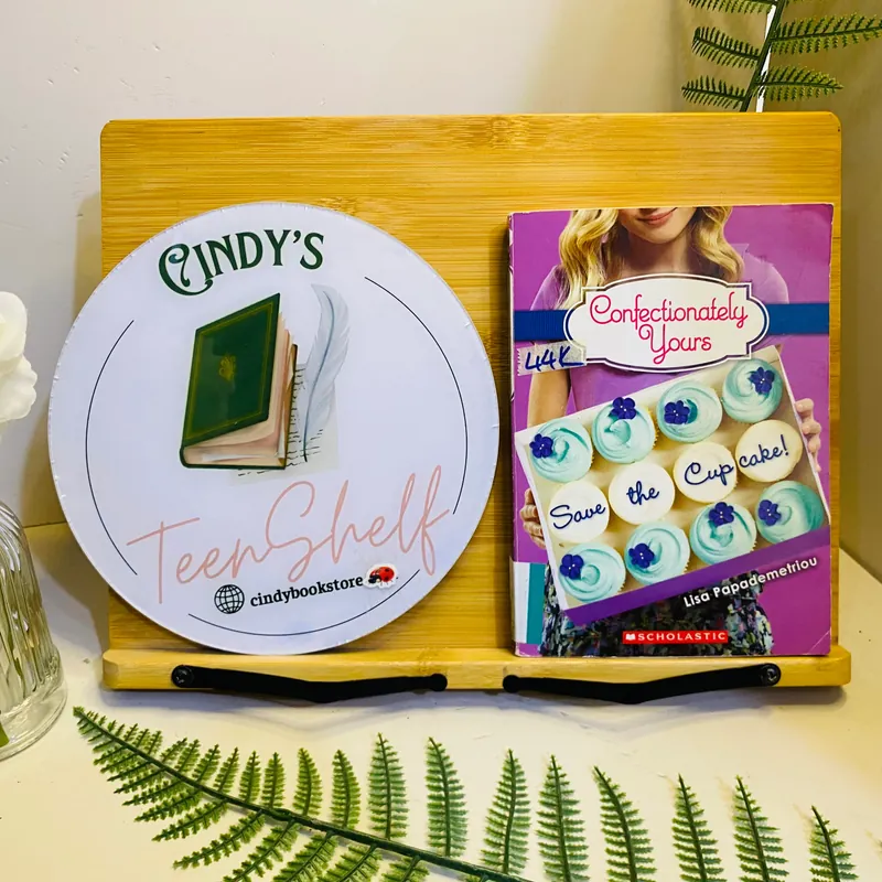 Sách tiếng Anh like new 90% -Confectionately Yours: Save the Cupcake! - Lisa Papademetriou 562281