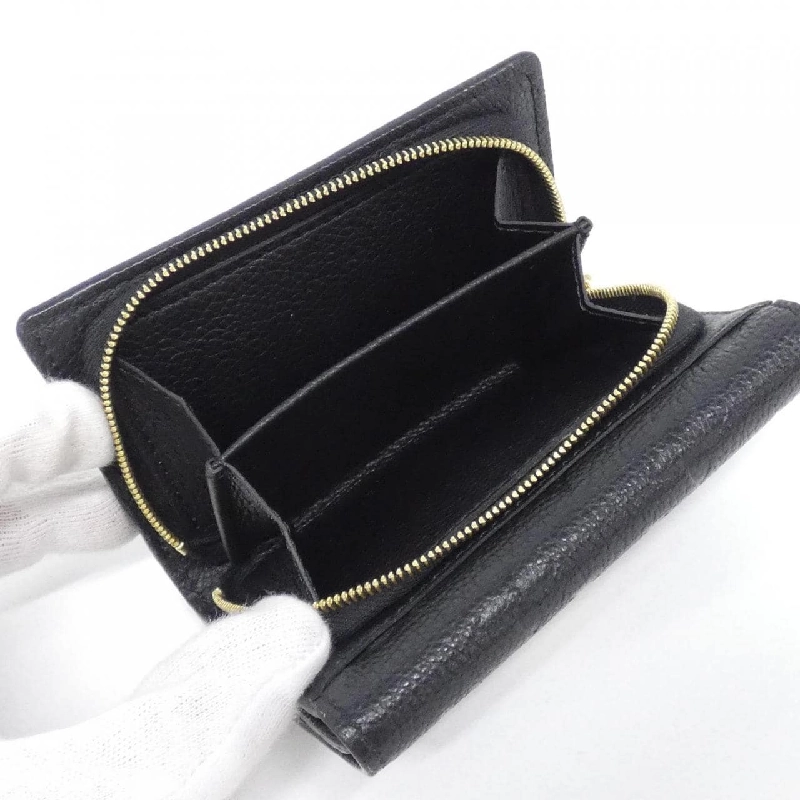 Ví Louis Vuitton Monogram Empreinte Portefeuille Métis Compact M80880 621909