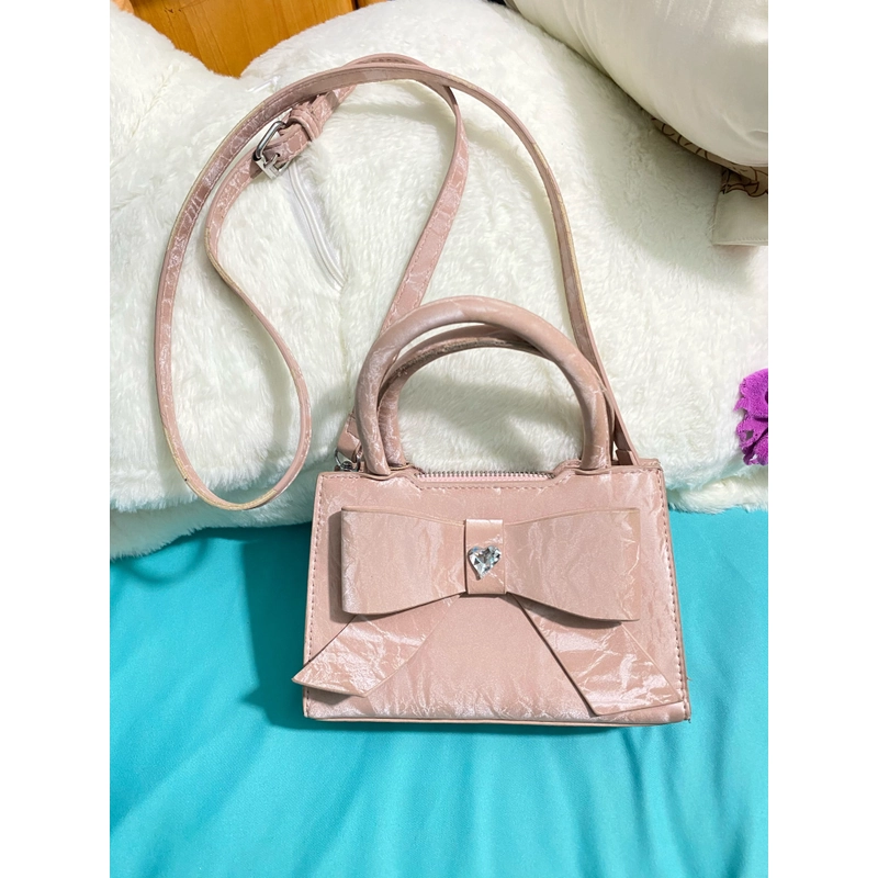 Túi nơ hồng pastel 90% đeo chéo 461792