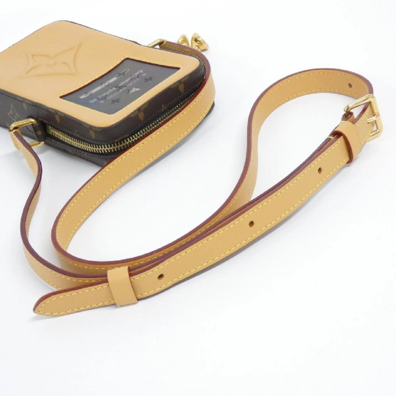 Túi xách mini Louis Vuitton Monogram Music Player Wearable Wallet M14063 - Hàng hiệu Chính hãng 767950