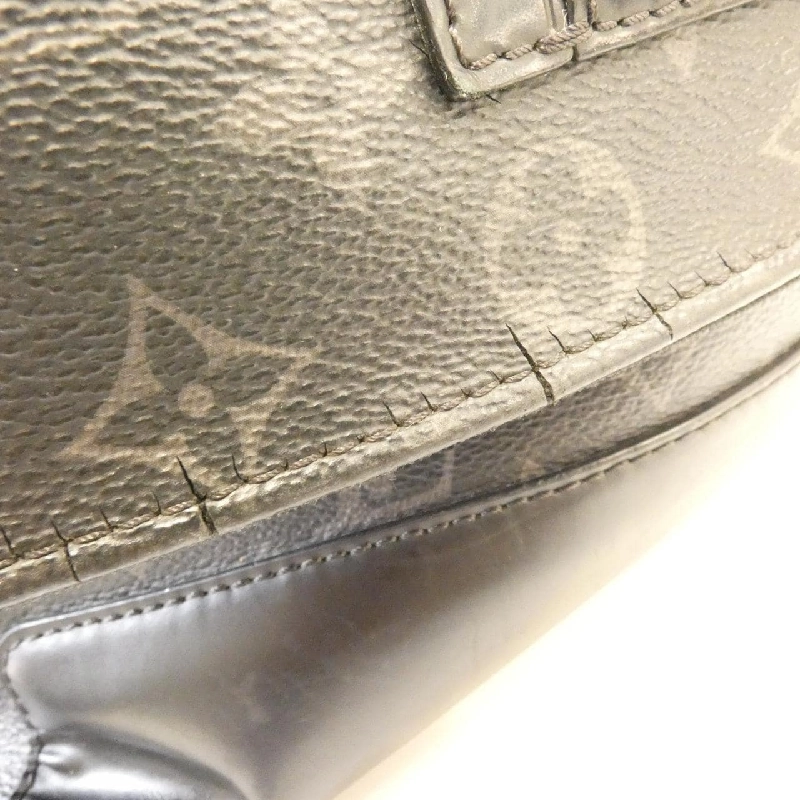 Túi đeo chéo Louis Vuitton Monogram Eclipse Voyage MM M40510 609842