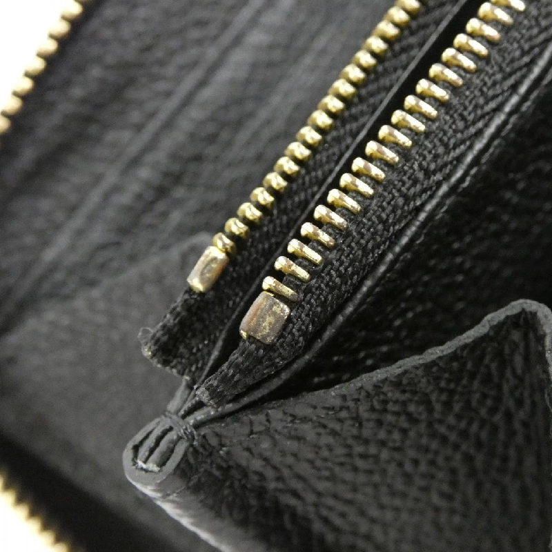 Ví Zippy Monogram Empreinte Hai Màu Louis Vuitton M80481 621647