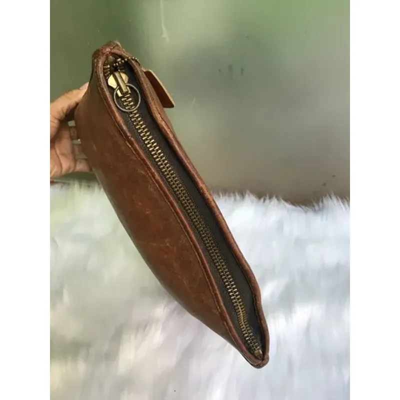 Túi loại cầm tay . COACH USA màu da bò 936341