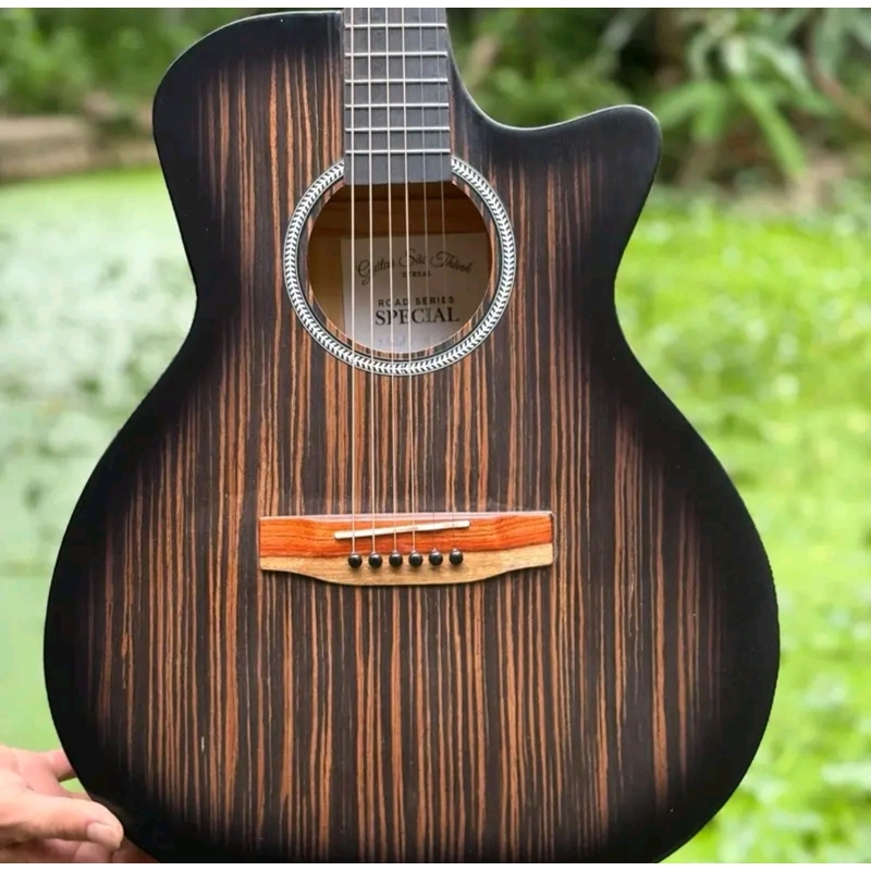 Đàn guitar bằng gỗ (có tặng kèm thêm kẹp đàn và phím gãy đàn) 545611