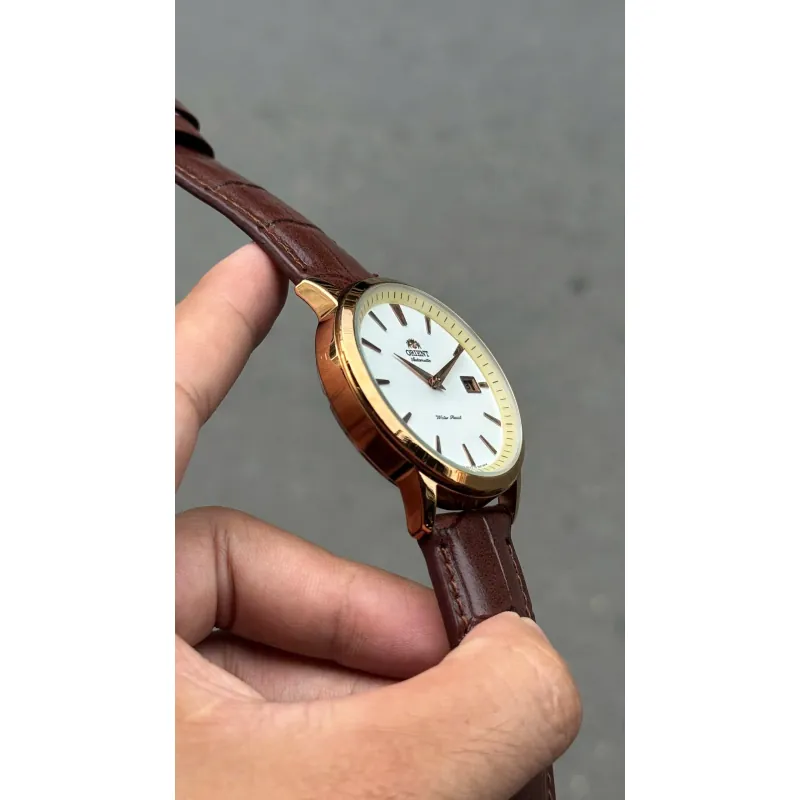 Đồng hồ Orient chính hãng, mặt tròn, dây da nâu, kim loại mạ vàng, phong cách cổ điển 706667