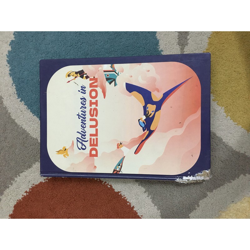 Adventures in DELUSION - bìa cứng, khổ to, giấy bồi cứng màu. 139351