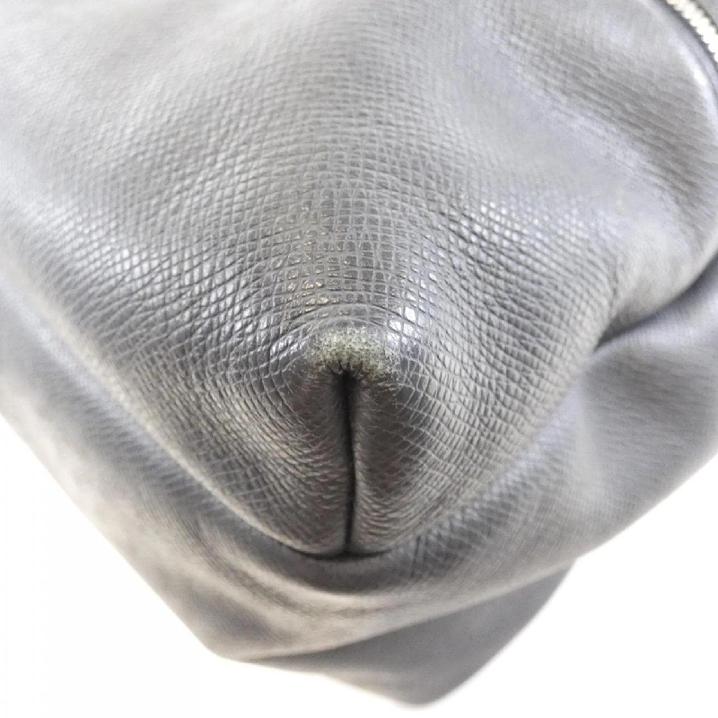 Ba lô Louis Vuitton Taiga Discovery M33451 609545