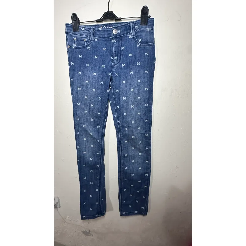 Quần jeans nữ slimfit thắt nơ họa tiết nơ nhỏ màu xanh đậm 734231