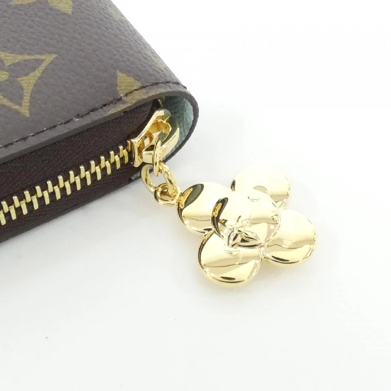 Ví Zippy Louis Vuitton Monogram (Vivienne Holiday) M12223 - Hàng hiệu Chính hãng 806534