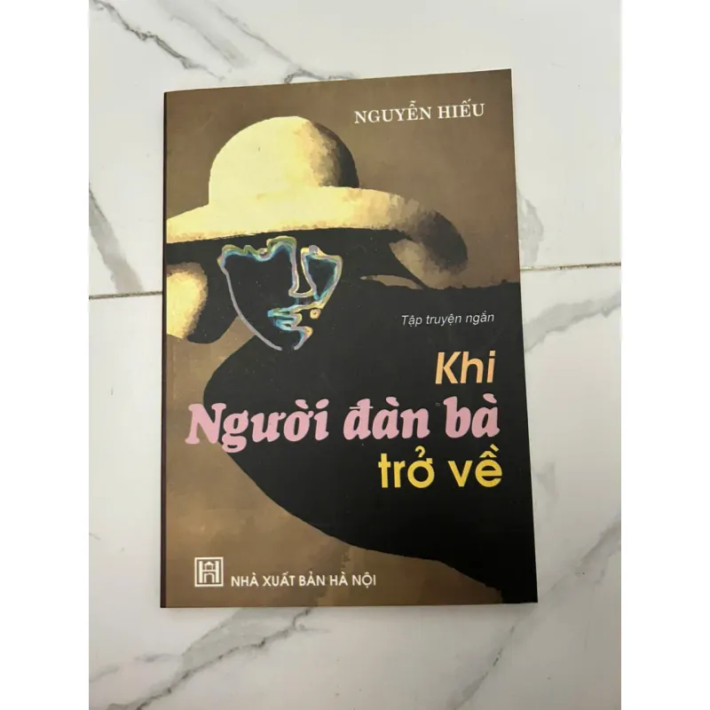 Khi Người Đàn Bà Trở Về Tập truyện ngắn - Nguyễn Hiểu 658699