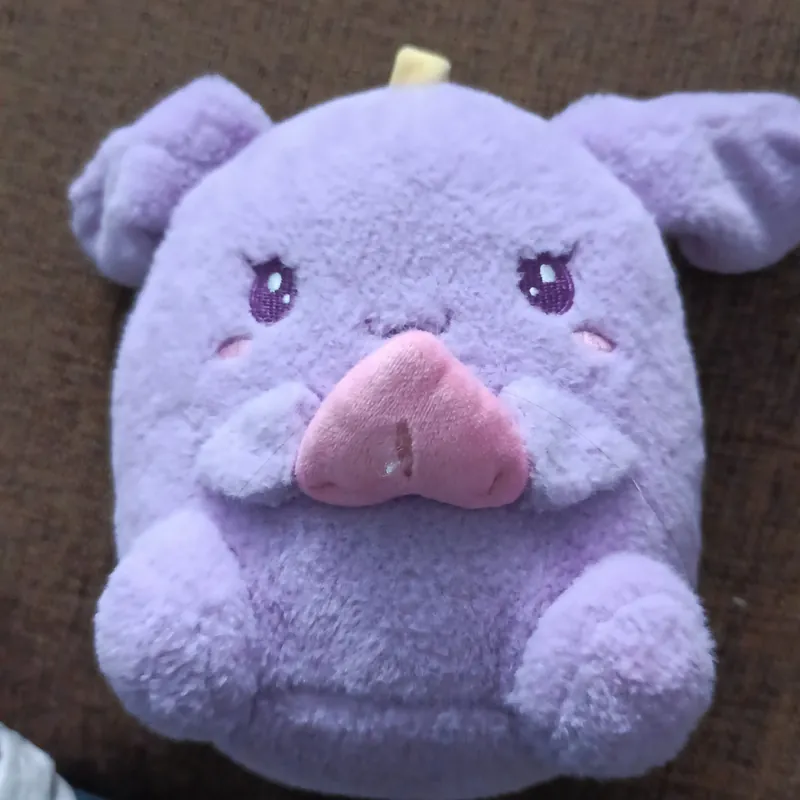 Gấu bông ôm tim tím 739621