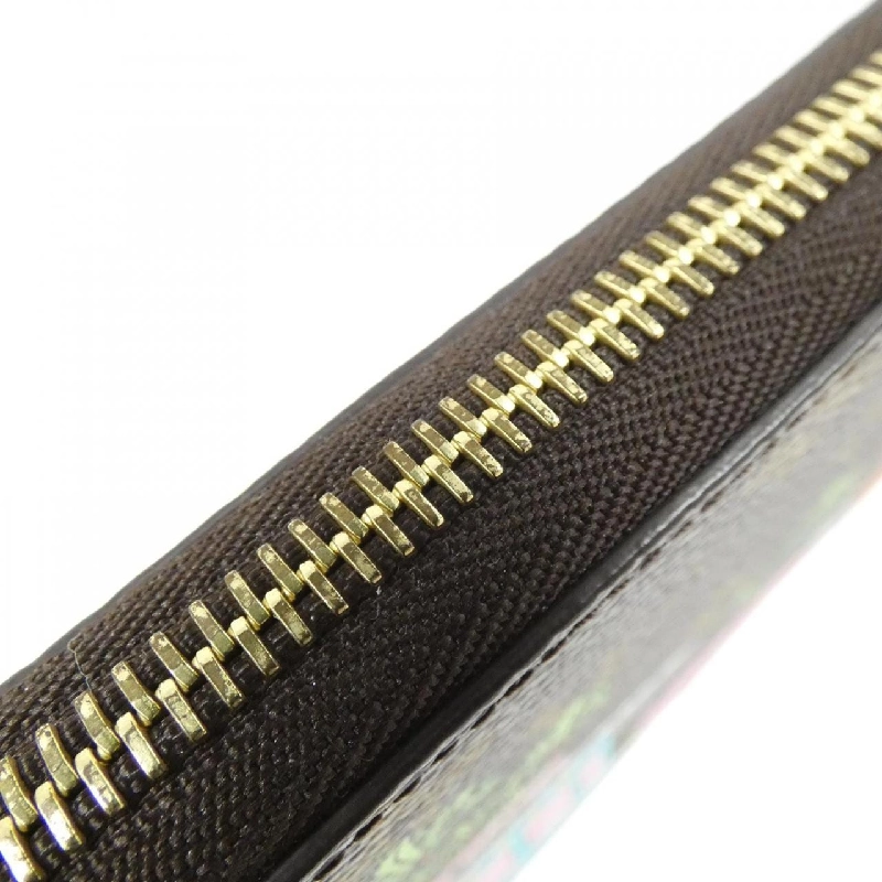 Ví Zippy Louis Vuitton Monogram (Vivienne Holiday) M80857 619649