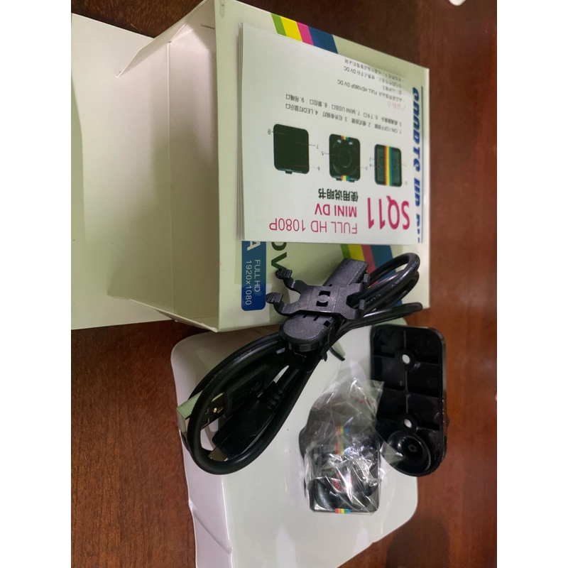 Mô hình camera sq11 siêu nhỏ ko hoạt động, đầy đủ sạc cáp đế 464250
