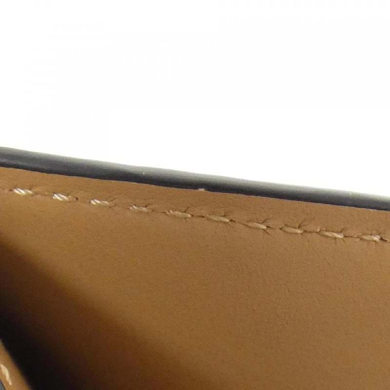 Ví LV Vertikal CP Trillon M81561 của Louis Vuitton 623440