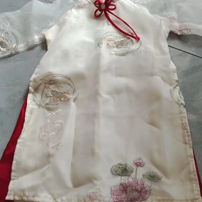 Áo dài thêu kem quần lụa  1024462