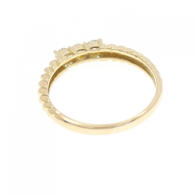 Nhẫn kim cương ba viên K18YG 0.22CT 667852