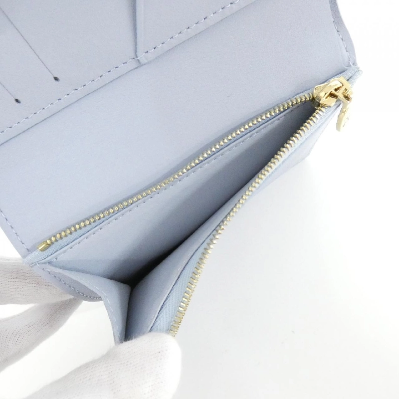 Ví compact LV Vertikal Louis Vuitton M83572 621628