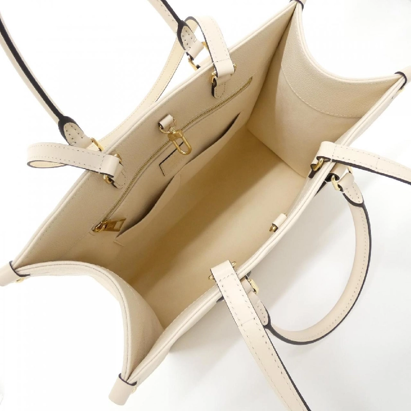 Túi Louis Vuitton Monogram Empreinte OnTheGo MM M46531 618912