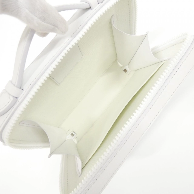 Túi xách vai Louis Vuitton LV Ornament Handle Soft Trunk M21833 609666