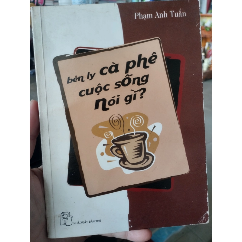Bên ly cà phê, cuộc sống nói gì?" của tác giả Phạm Anh Tuấn.  496482