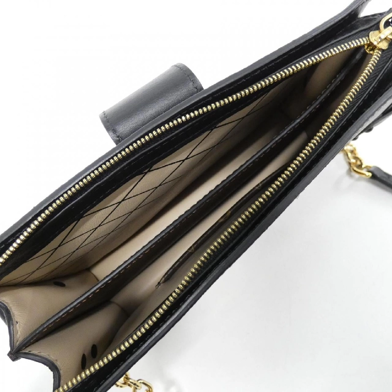 Túi xách đeo vai Louis Vuitton Monogram Reverse Trunk Clutch M43596 - Hàng hiệu Authentic 776648