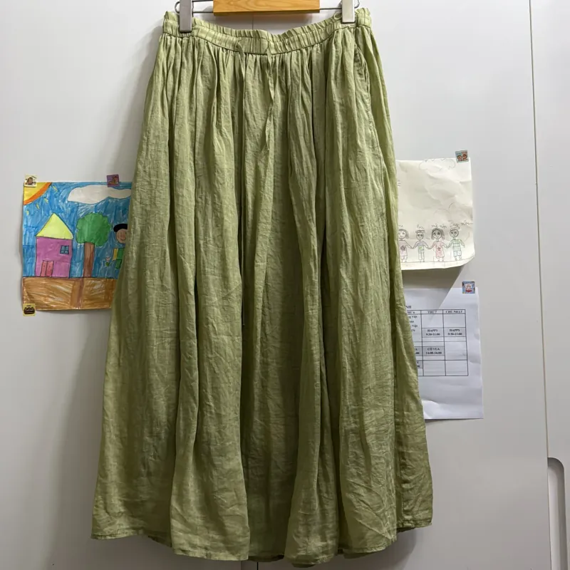 Chân váy màu xanh bơ 1009513