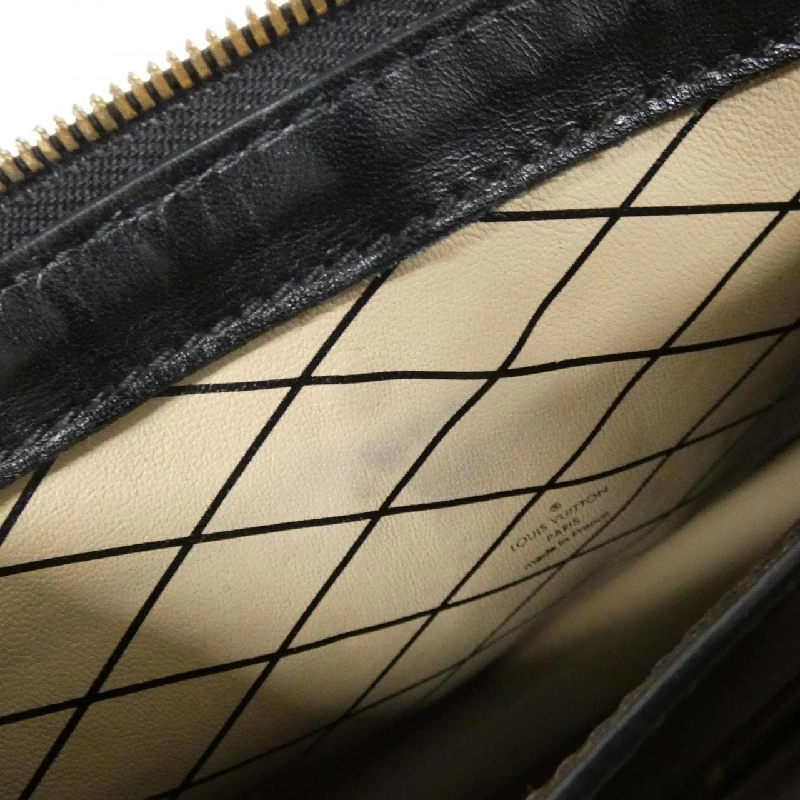 Túi xách đeo vai Louis Vuitton Monogram Reverse Trunk Clutch M43596 611739