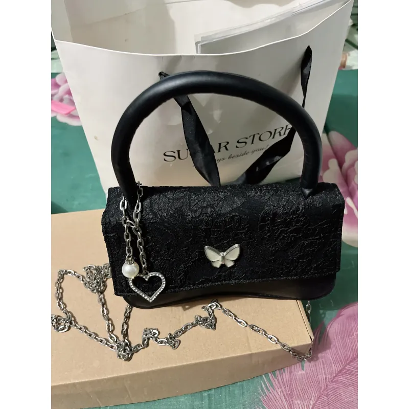 tui xach nu thoi trang mau den va hong 1042885
