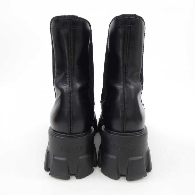 Giày boot Monolith Chelsea logo tam giác PRADA 1T256N 656643