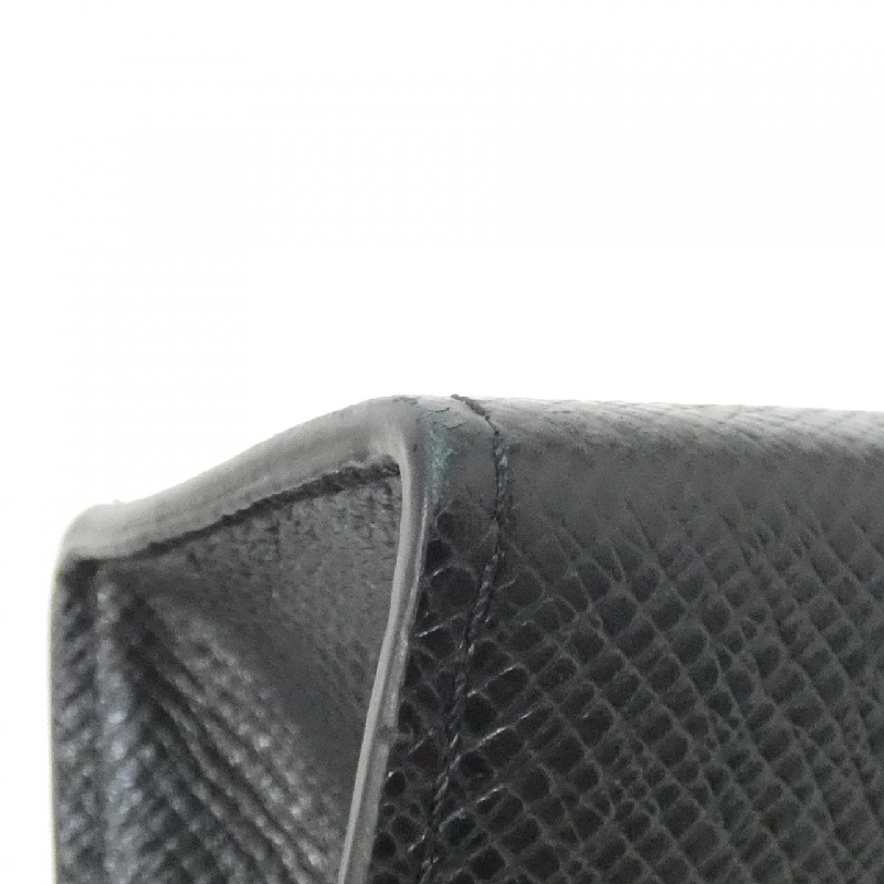 Túi xách Louis Vuitton Taiga Pochette Voyage M30450 - Hàng hiệu Chính hãng 805715