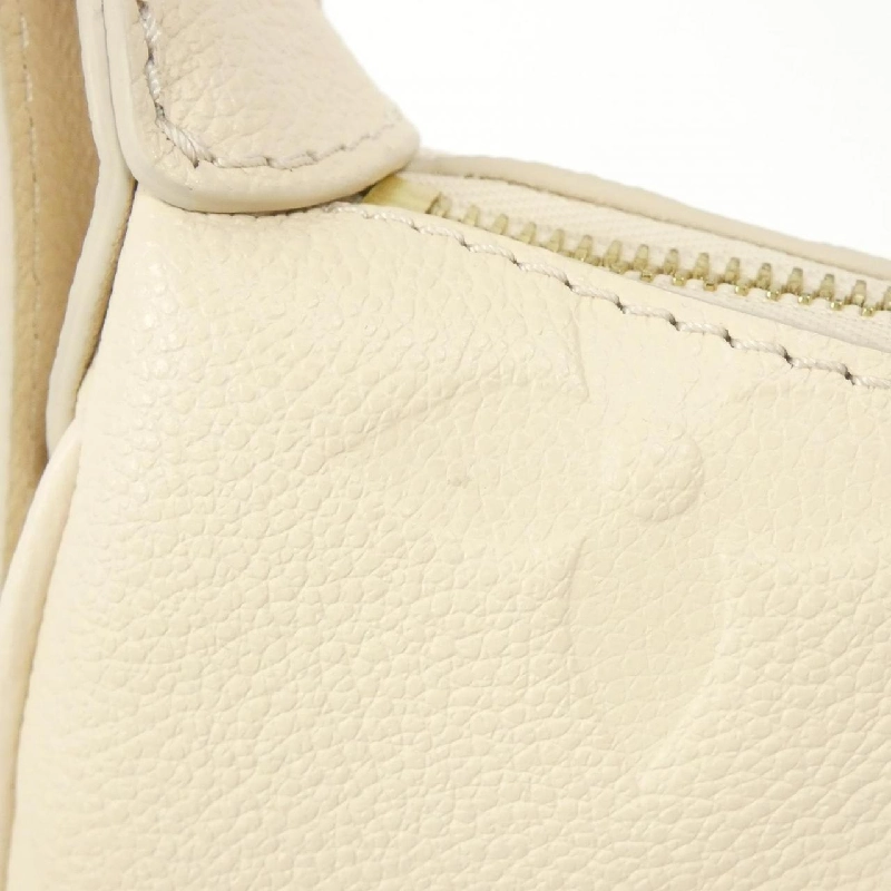 Túi xách vai Louis Vuitton Monogram Empreinte Mini Moon M82519 613540