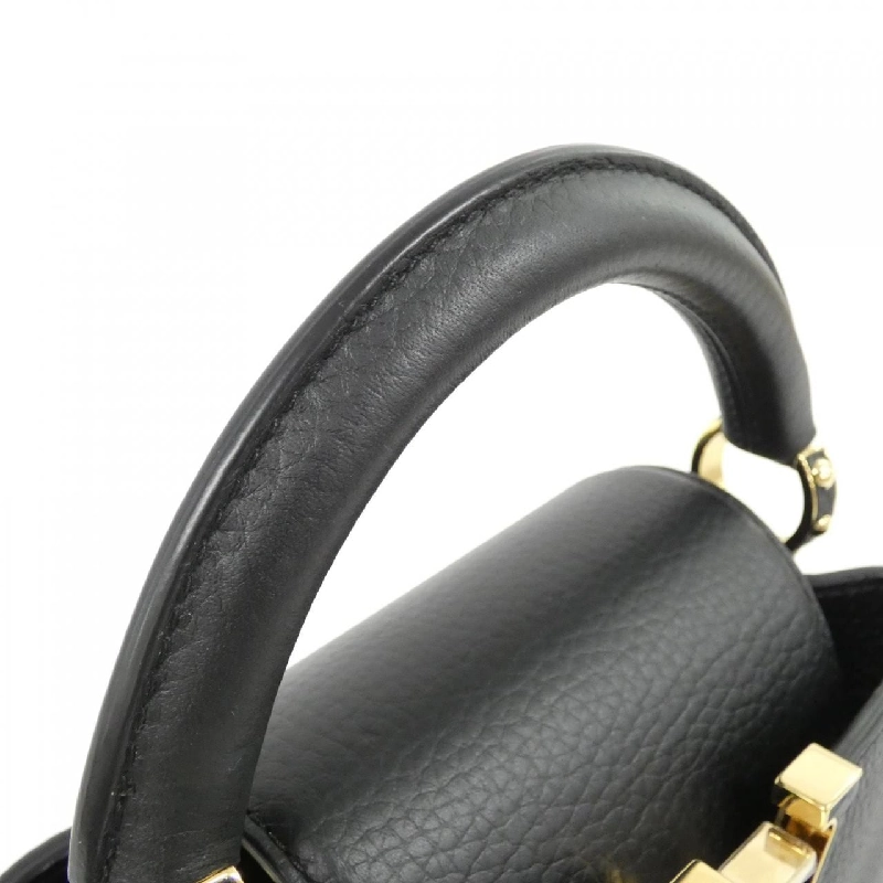 Túi Louis Vuitton Capucines MINI M56071 619797