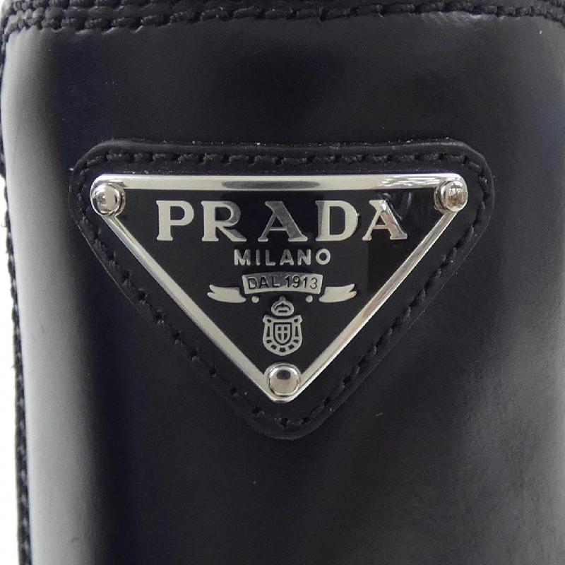 Giày boot Monolith Chelsea logo tam giác PRADA 1T256N 656643