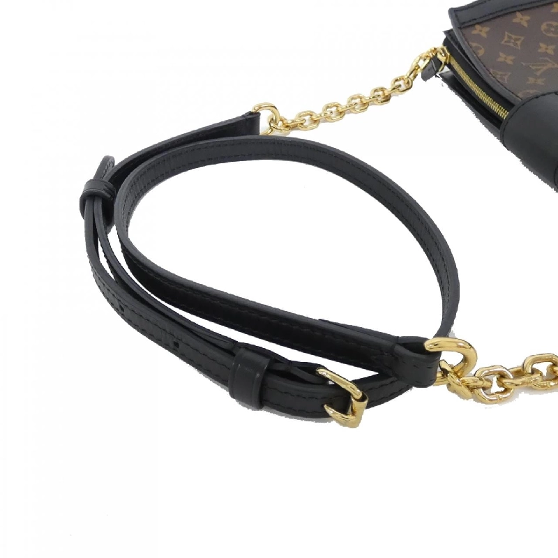 Túi xách đeo vai Louis Vuitton Monogram Reverse Trunk Clutch M43596 611712