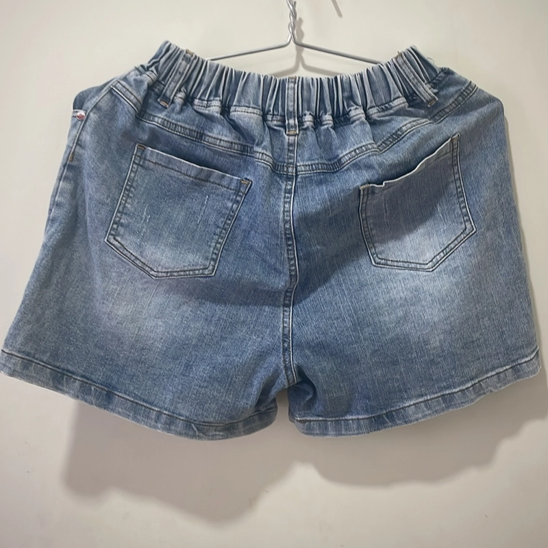 Quần short jean nữ lưng thun 70% size S 536299