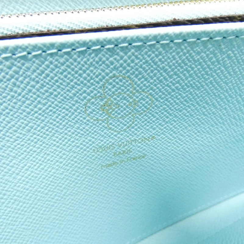 Ví Zippy Louis Vuitton Monogram (Vivienne Holiday) M12223 621921