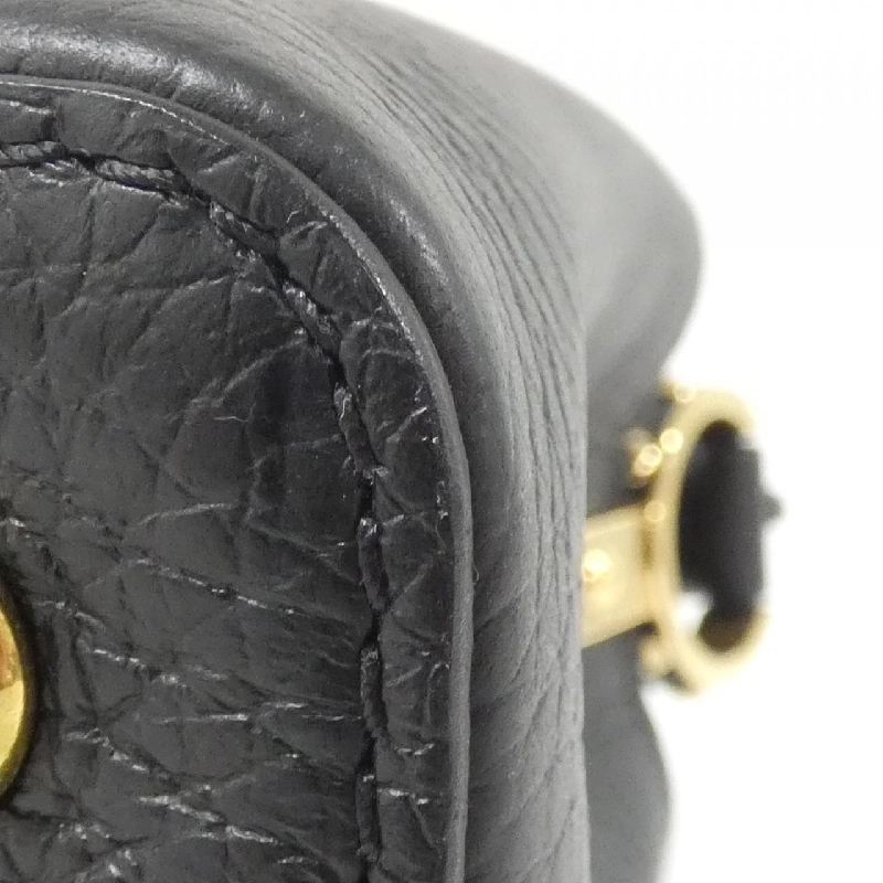 Túi Louis Vuitton Capucines MINI M56071 618251