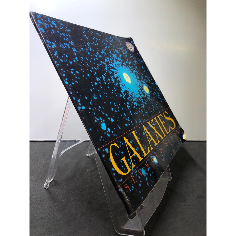 Galaxies mới 80% bẩn nhẹ gấp bìa Seymour Simon HPB2607 NGOẠI VĂN 458750