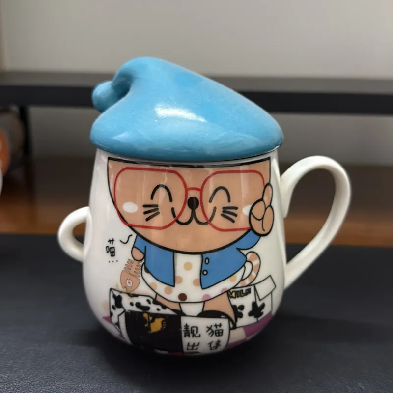 Bộ 2 ly sứ hình mèo và mặt cười 957687