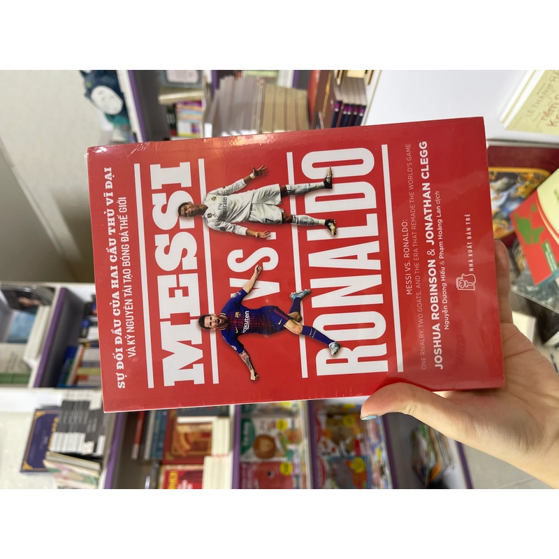 MESSI vs. RONALDO - Joshua Robinson & Jonathan Clegg 494496