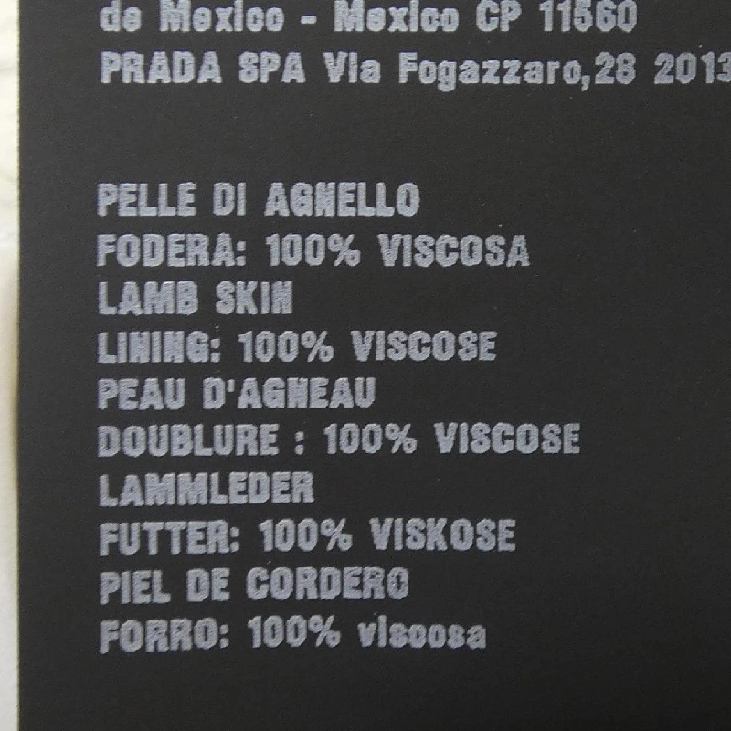Áo khoác da PRADA với logo hình tam giác UPW463 S231 1WDV - Hàng hiệu Chính hãng 887009
