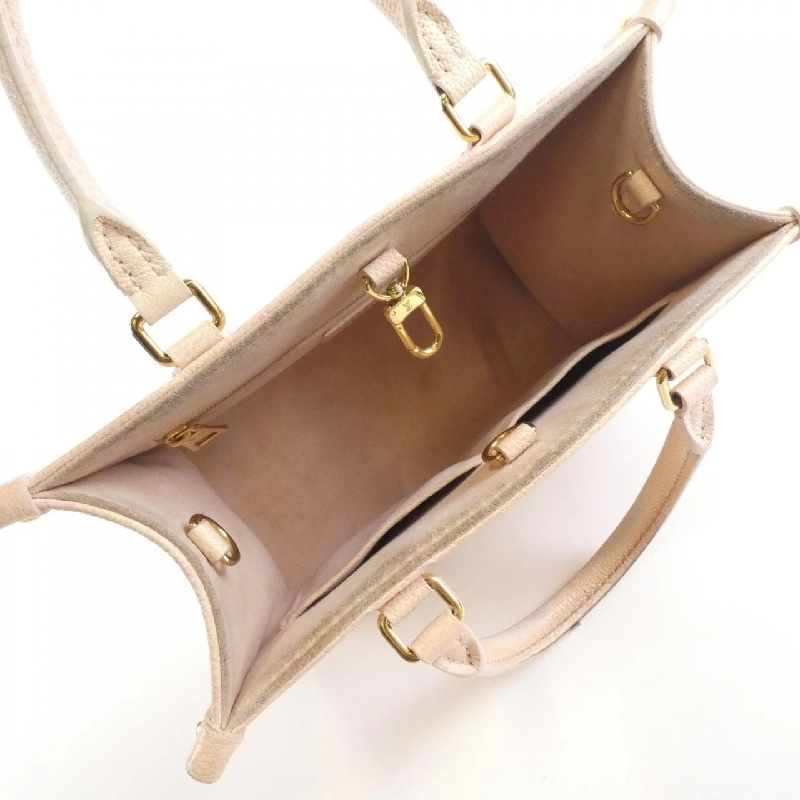 Túi xách Louis Vuitton Monogram Empreinte (Summer Stardust) OnTheGo PM M46168 - Hàng hiệu Authentic 771306