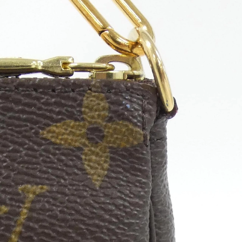 Túi đeo chéo mini Louis Vuitton Monogram (Holiday) M63830 - Hàng hiệu Authentic 769351