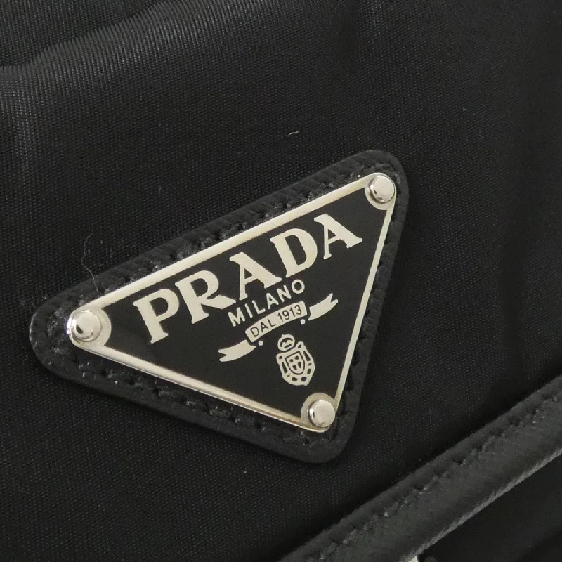 Túi đeo vai Prada 2VH133 611030