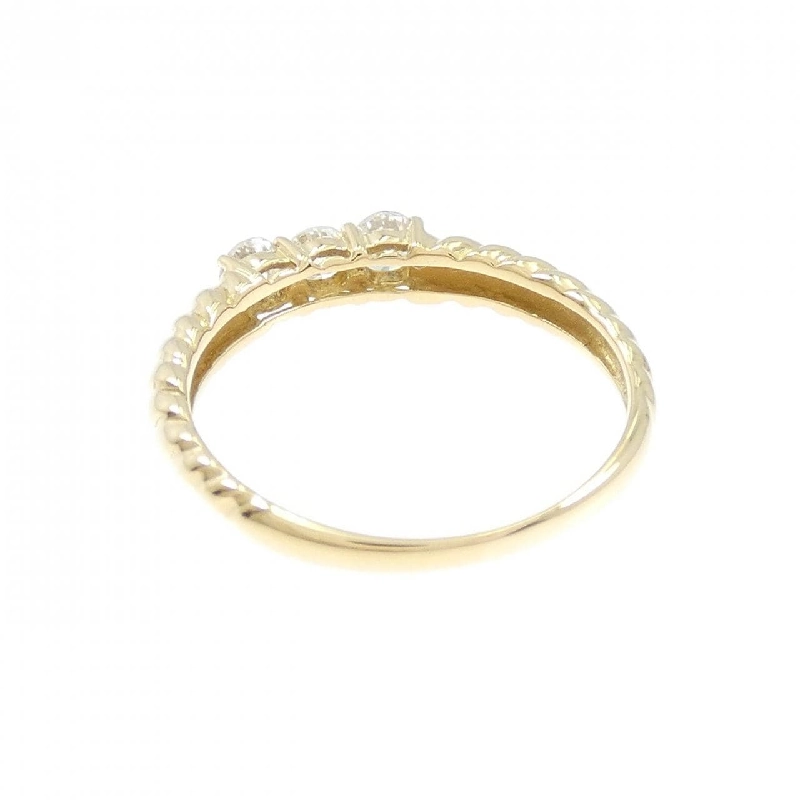Nhẫn kim cương ba viên K18YG 0.22CT - Hàng hiệu Chính hãng 854454