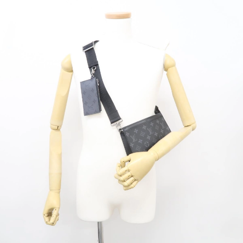 【Sản phẩm chưa sử dụng】Ví đeo tay Louis Vuitton Monogram Eclipse Reverse Gaston M81124 613670