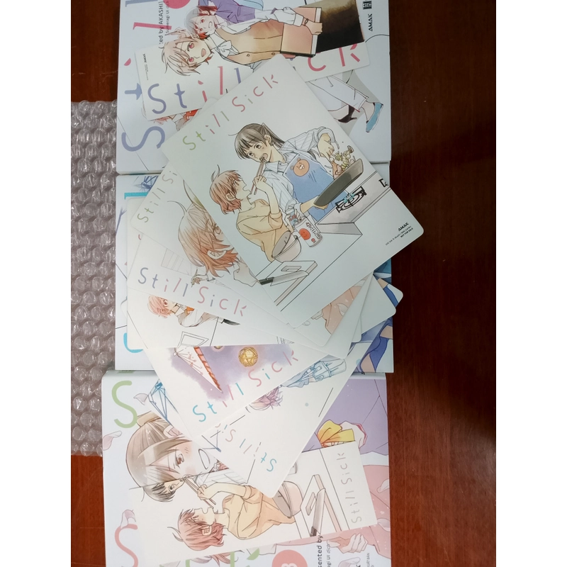 Still sick(3 quyển + postcard, bookmark) 537311