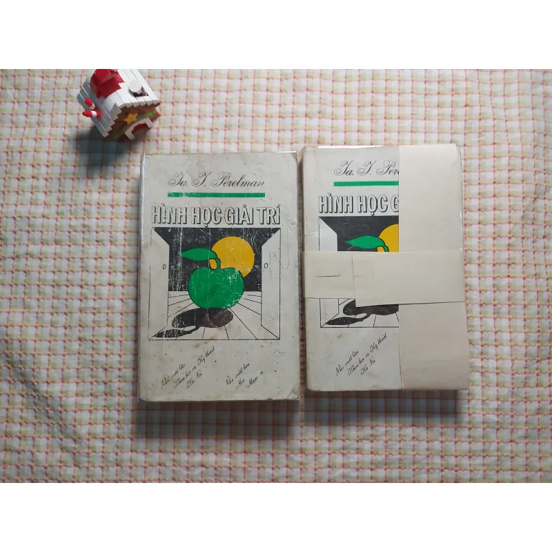 HÌNH HỌC GIẢI TRÍ - Ia. I. Perelman • CÒN CUỐN PHẢI (BỊ CẤN, CONG GIẤY) 763840